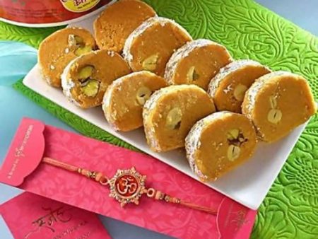 Auspicious Peach Om Rakhi & Batisha Slice Combo Discount