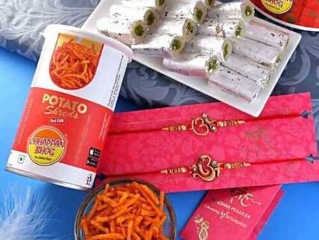 2 Divine Om Rakhis & Pista Kaju Roll Box Hamper Combo Fashion