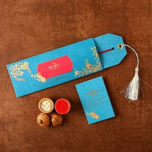 Vibrant Ganesha Rakhi & Cadbury Fruit N Nut Chocolates Online now